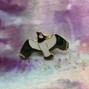Bird lapel pin. 63